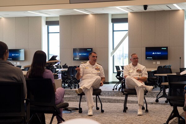 BILLINGS, Mont. (Aug. 10, 2023) Rear Adm. Matthew Case, commander, Naval Medical Forces Atlantic (NMFL), and NMFL Command Master Chief Zachary Pryor, a native of Glendive, Mont., answers questions from students and staff from Rocky Vista University.