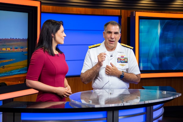 BILLINGS, Mont. (Aug. 11, 2023) Rear Adm. Matthew Case, commander, Naval Medical Forces Atlantic, speaks with Augusta McDonnell, the news anchor for Montana This Morning, during a live interview at KTVQ studio.