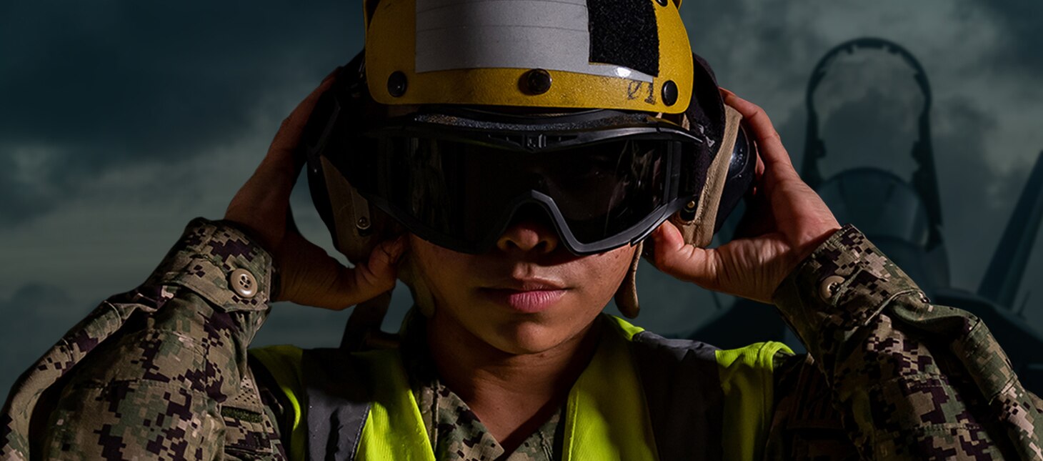 Aviation Boatswain's Mate (Handling) 2nd Class Jynishia Wilson poses for a photo onboard Naval Air Facility (NAF) Atsugi, Japan, Feb. 15, 2022.