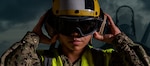 Aviation Boatswain's Mate (Handling) 2nd Class Jynishia Wilson poses for a photo onboard Naval Air Facility (NAF) Atsugi, Japan, Feb. 15, 2022.