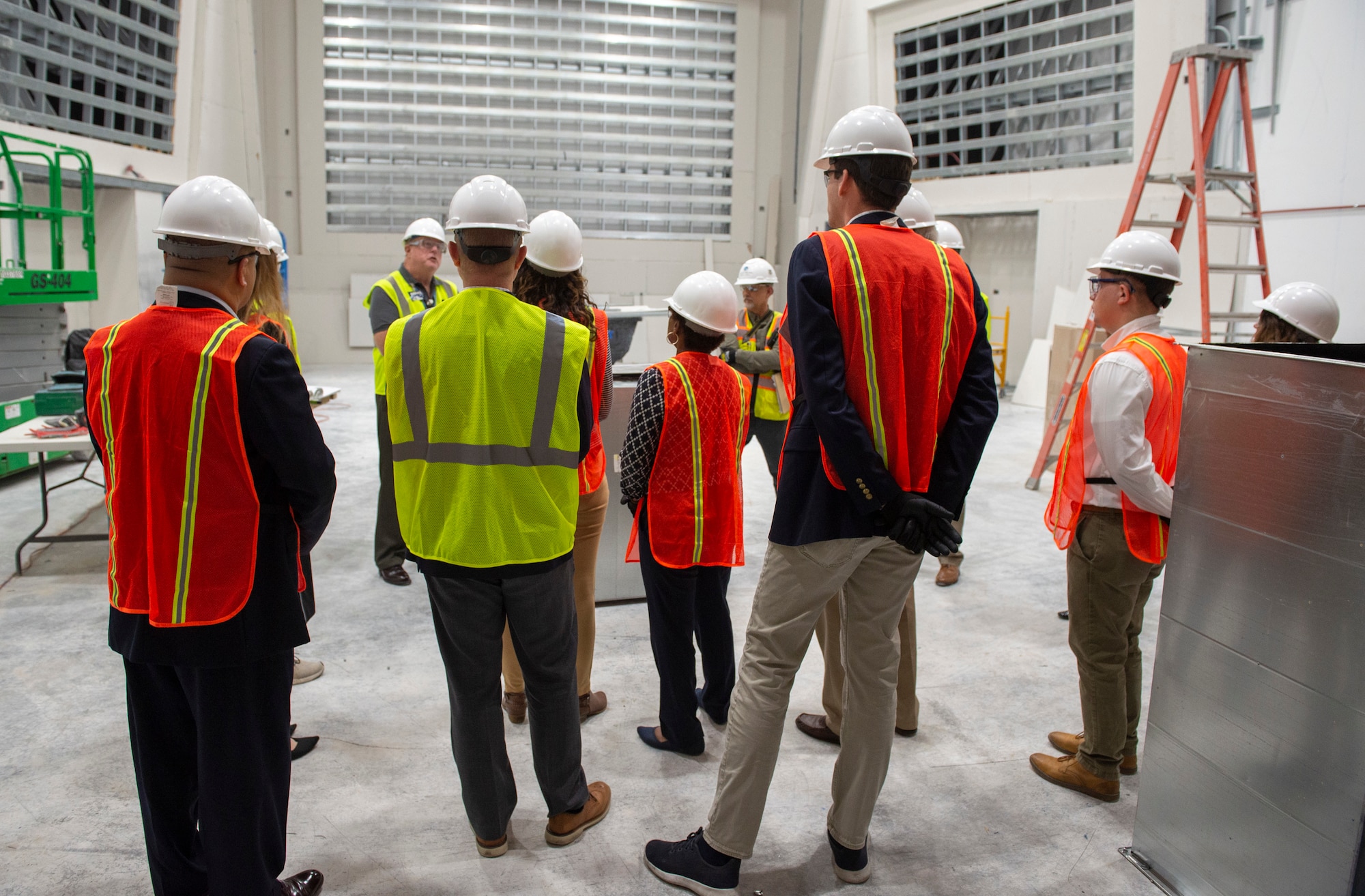 A delegation of congressional staffers listen to a briefing given by a construction team lead of the new Intelligence Production Center III, during their visit to Wright-Patterson Air Force Base, Ohio, August 29, 2023. The staffers’ visit was an informational tour to educate them on the capabilities of WPAFB and its tenant units.