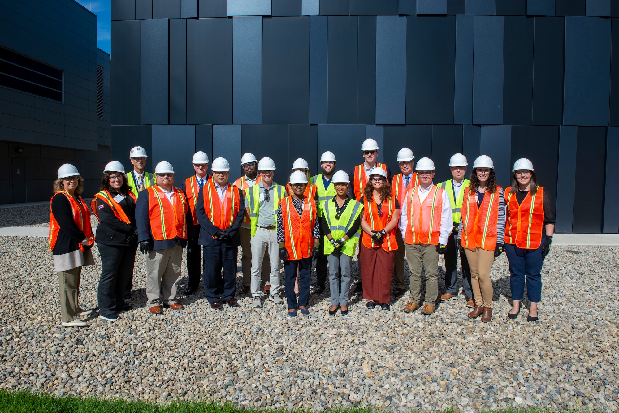 A delegation of congressional staffers pose for a photo in front of the new National and Space Intelligence Center’s Intelligence Production Center III during their visit to Wright-Patterson Air Force Base, Ohio, August 29, 2023. The purpose of this visit and tour was to educate and inform on Wright-Patterson Air Force Base, its tenants’ missions, and the synergy between them.