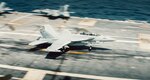 An EA-18G Growler assigned to Electronic Attack Squadron (VAQ) 144 lands on the flight deck of the Nimitz-class aircraft carrier USS George Washington (CVN 73) while underway in the Atlantic Ocean June 26, 2023. George Washington is underway conducting flight deck certification, an evaluation of the ships' proficiency to safely launch and recover aircraft.