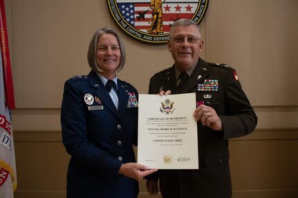 Chaplain (Col.) Bobby R. Patton, Jr., state command chaplain for the District of Columbia National Guard, is recognized during a ceremony to celebrate his retirement from military service, in the Commanding General’s Conference Room of the DCNG Armory, in Washington, D.C.