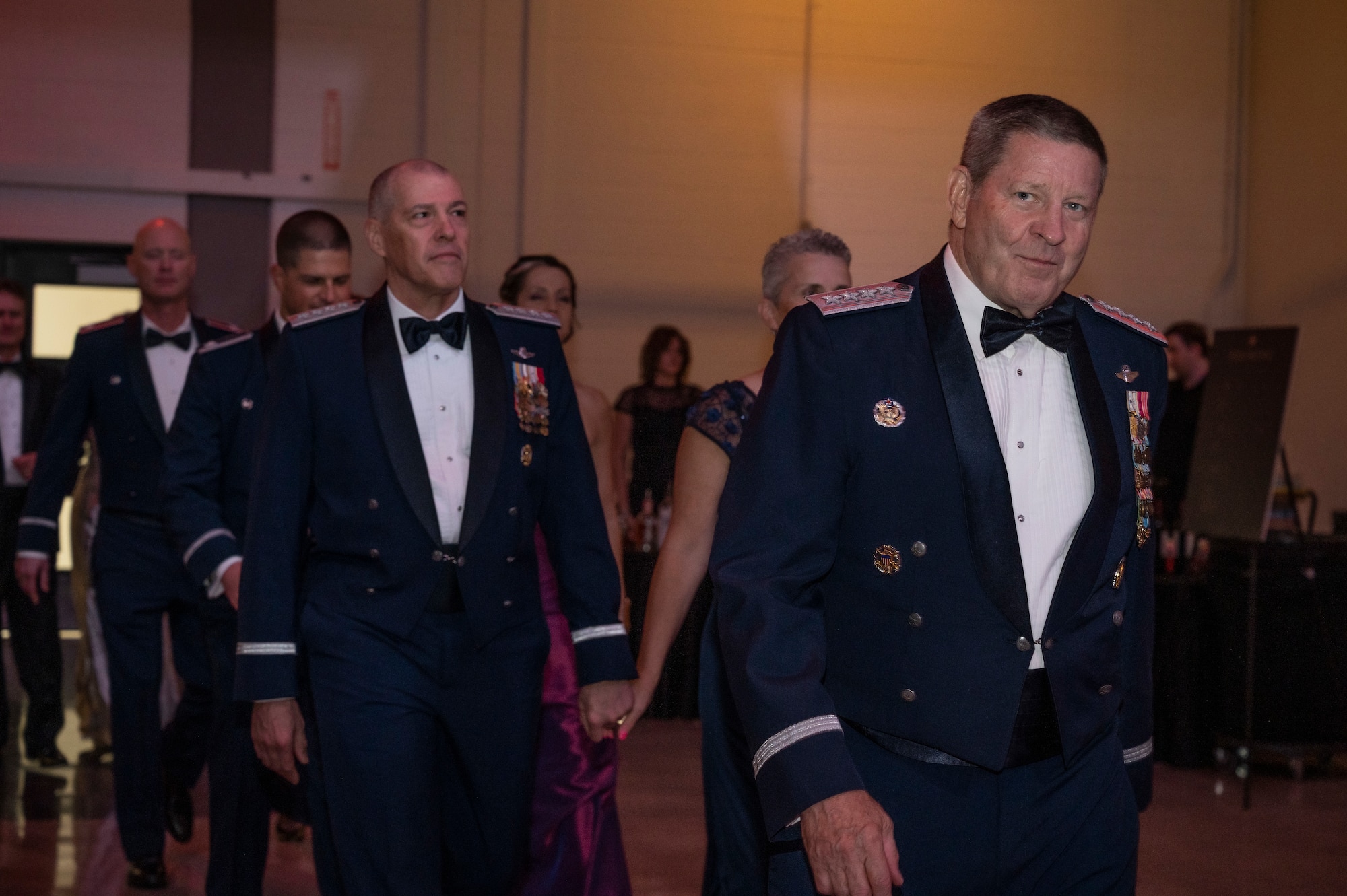 The Dyess Air Force Base and Air Force Global Strike leadership teams along with members of the Abilene Military Affairs Committee enter the Abilene MAC and Dyess Air Force Gala in Abilene, Texas, Aug. 26, 2023.  The event was held to celebrate the MAC’s 70th anniversary and the  Air Force’s 76th birthday. The Abilene MAC hosted the gala to honor Dyess Airmen and the legacy they have created at America’s only Lift and Strike Base.