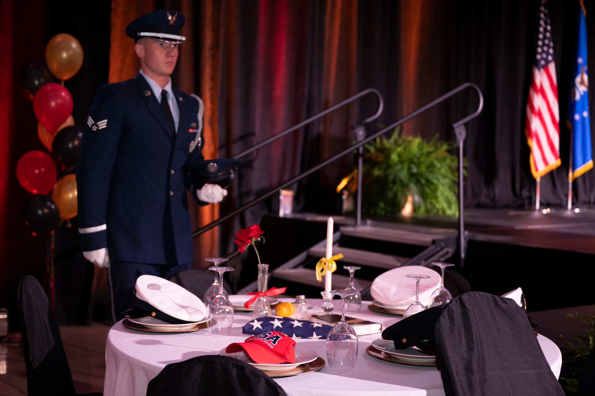 A Dyess honor guardsman performs a prisoner-of-war and missing in action ceremony during the Abilene Military Affairs Committee and Dyess Air Force Gala in Abilene, Texas, Aug. 26, 2023. This year’s gala theme was the celebration of 76 years of Air Force heritage and the 70th anniversary of the Abilene MAC and their commitment to ensuring an active and supportive relationship between Dyess and the Abilene community. The MAC showed its appreciation to Dyess Airmen and their families by providing free food, entertainment and childcare. (U.S. Air Force photo by Airman 1st Class Alondra Cristobal Hernandez)