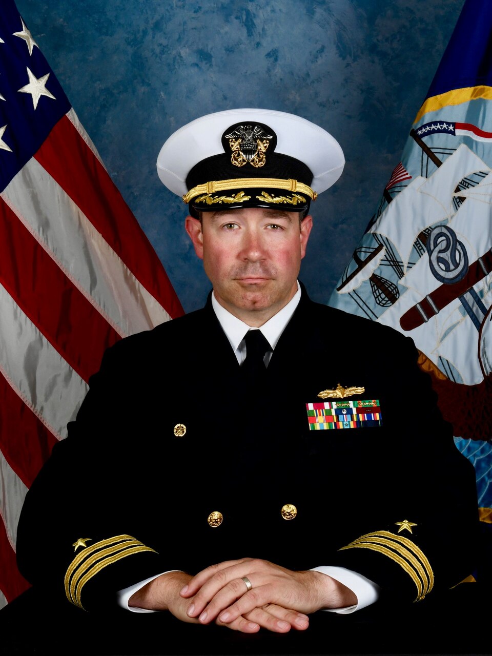 Cmdr. Justin M. Neff