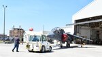 The last TAV-8B Harrier trainer to be completed by Fleet Readiness Center East (FRCE) is wheeled into the AV-8 hangar before it is delivered to Marine Attack Squadron (VMA) 223 at Cherry Point. FRCE’s Harrier production line is expected to induct three more AV-8s before the program ends in 2025.