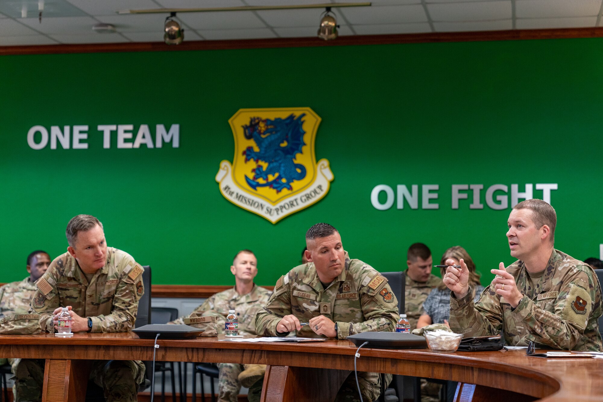 U.S. Air Force Chief Master Sgt. Michael Venning, 81st Training Wing command chief, receive a welcome brief before his immersion tour with the 81st Mission Support Group at Keesler Air Force Base, Mississippi, Aug. 2, 2023.