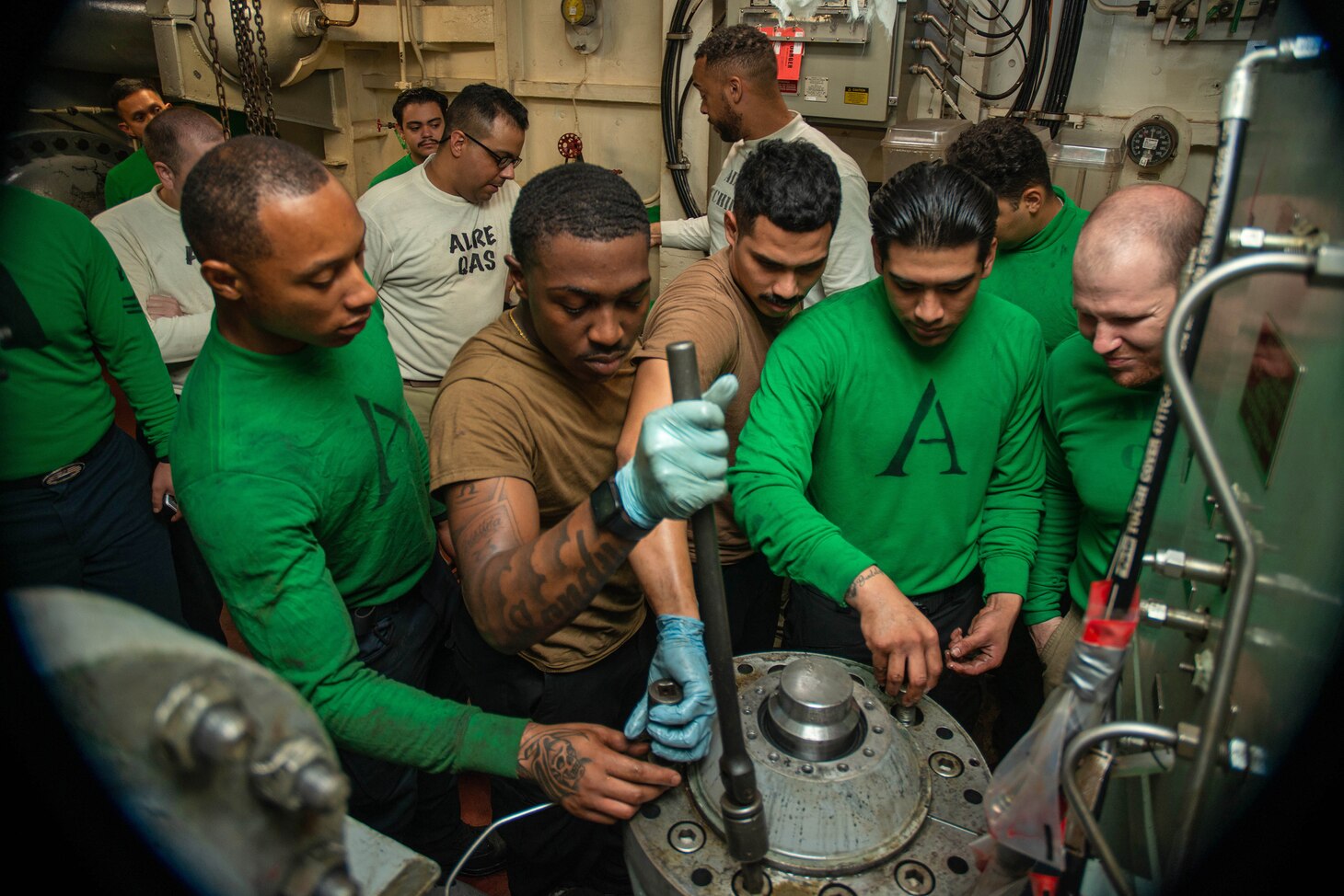 U.S. Navy Sailors disassemble a constant runout valve for maintenance aboard the aircraft carrier USS Nimitz (CVN 68). Nimitz is in U.S. 7th Fleet conducting routine operations. 7th Fleet is the U.S. Navy's largest forward-deployed numbered fleet, and routinely interacts and operates with Allies and partners in preserving a free and open Indo-Pacific region.