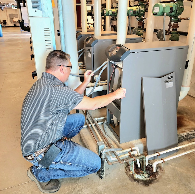 Kevin Carse inspects a boiler located at the Army Reserve Center at Fort Benjamin Harrison, Indianapolis, Indiana. Carse, Electrical Engineering Technician, performs duties supporting BASEOPS out of the Louisville District’s Indianapolis Resident Office.