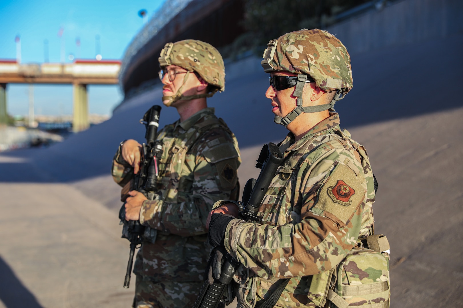 Members of the Oklahoma National Guard, Spc. Darrell Casey (left), member of 1st Battalion, 160th Field Artillery Regiment, 45th Infantry Brigade Combat Team, and Staff Sgt. Patrick Sanchez (right), member of the 137th Special Operations Wing, perform border operations along the Rio Grande River, August 2, 2023. Approximately 50 Soldiers and Airmen are assisting the Texas National Guard with border security by manning security points to identify and alert local law enforcement of any illegal immigrant or drug trafficking activities. The deployment is expected to last through the end of August with a follow-on deployment of an additional 50 Soldiers and Airmen sometime in 2024. (Oklahoma National Guard photo by Sgt. Reece Heck)
