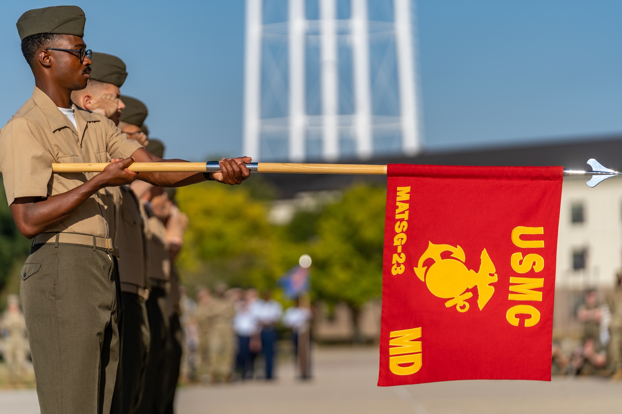 U.S. Marines with the Marine detachment present arms as a part of their routine during the drill down at Keesler Air Force Base, Mississippi, Aug. 18, 2023.