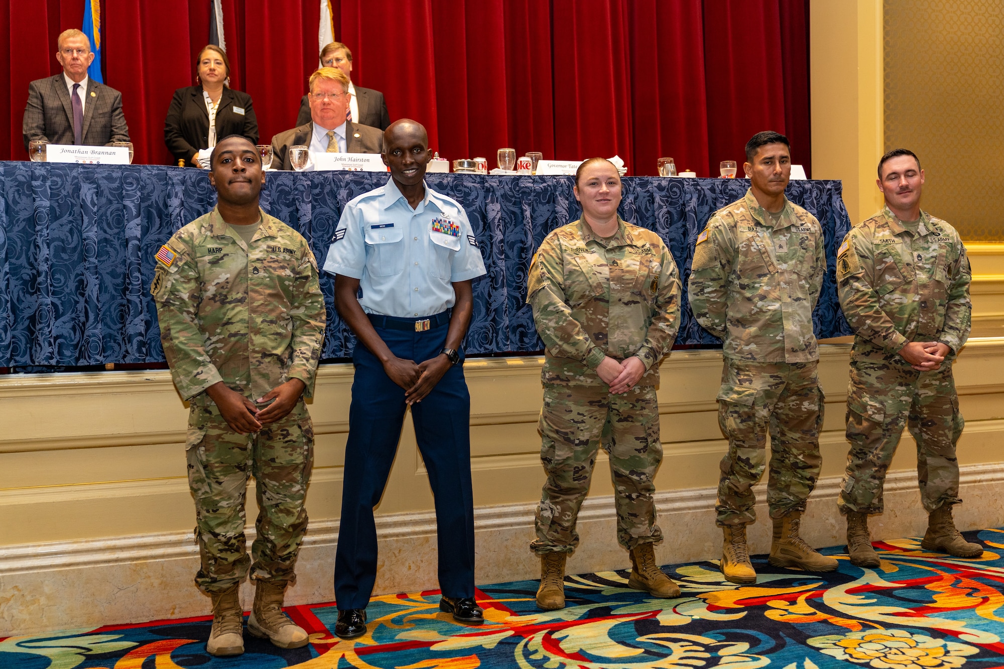 U.S. Air Force Senior Airman Paul Modi, 81st Logistics Squadron fleet management analysis technician, poses with other nominees for the Thomas V. Fredian Community Leadership Award during the 42nd Annual Salute to the Military at the Beau Rivage Resort and Casino, Mississippi, Aug. 29, 2023.