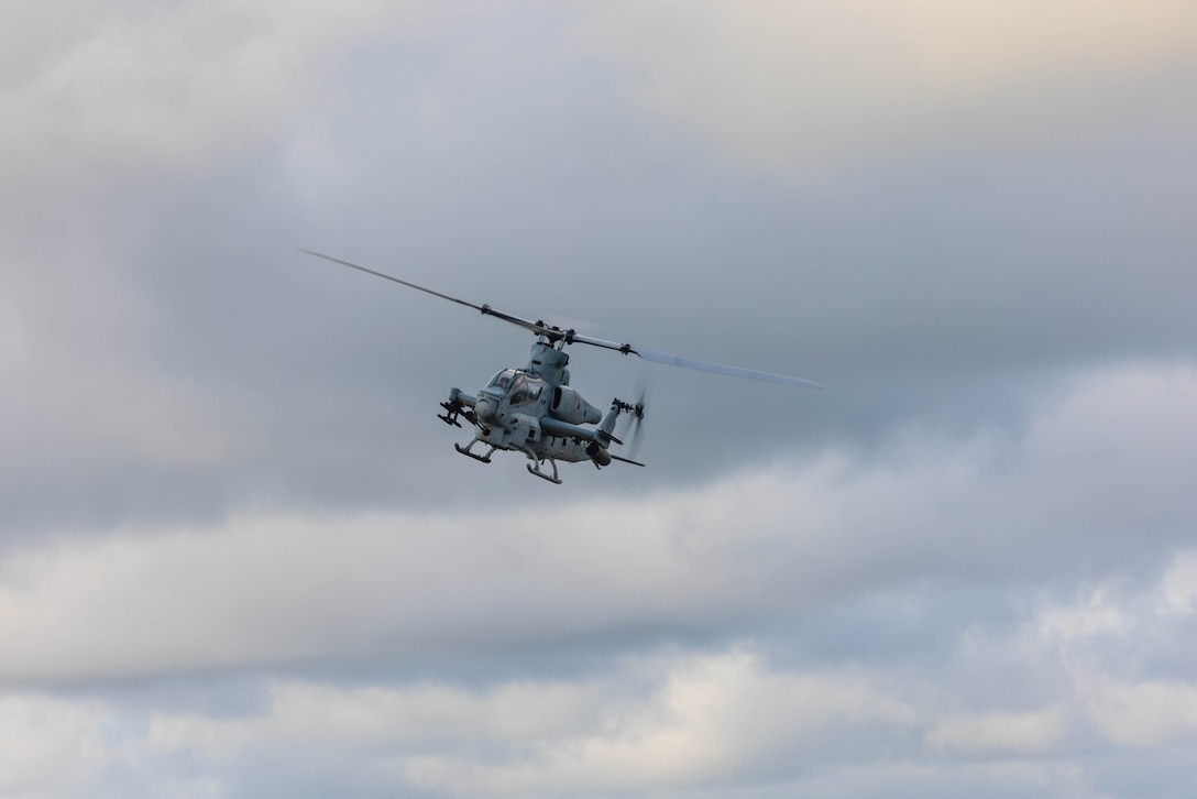 An AH-1Z Viper assigned to Marine Light Attack Helicopter Squadron 167, 2nd Marine Aircraft Wing, at Marine Corps Air Station (MCAS) New River, provides close air-support during Exercise Mjolnir Strike 4-23, at Bombing Target 11 (BT-11), Piney Island, North Carolina, Aug. 17, 2023. Exercises such as Mjolnir Strike require multiple facets of coordination and planning to become whole. MCAS Cherry Point and its outlying ranges provide the support needed to effectively test and train, bringing out the full realization of Mjolnir Strike and more. (U.S. Marine Corps photo by Cpl. Jade Farrington)