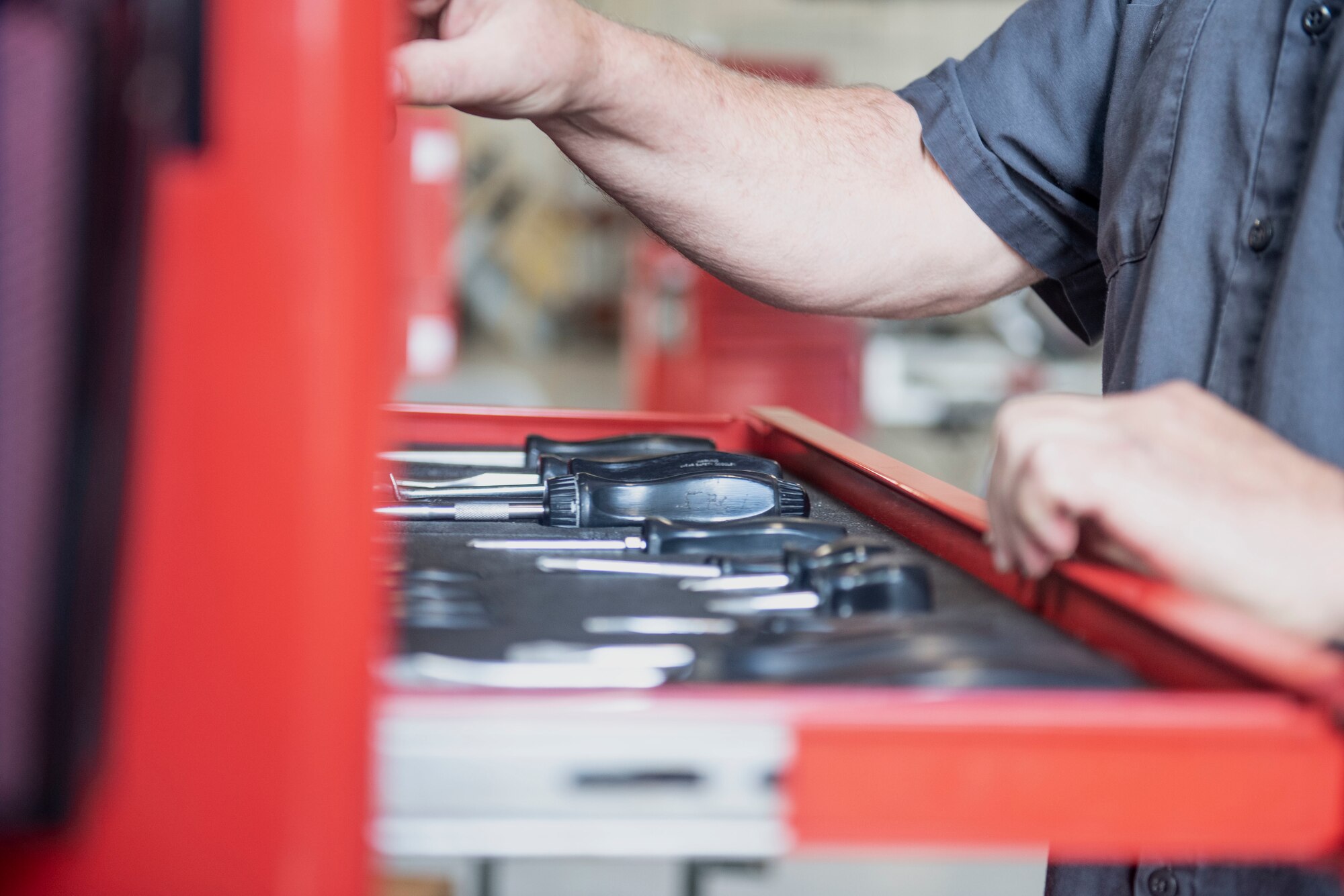 Heavy wheel mechanics repair a variety of military vehicles including, but not limited to, snowplows and snow brushes. (U.S. Air Force photo by Airman 1st Class Kylee Tyus)