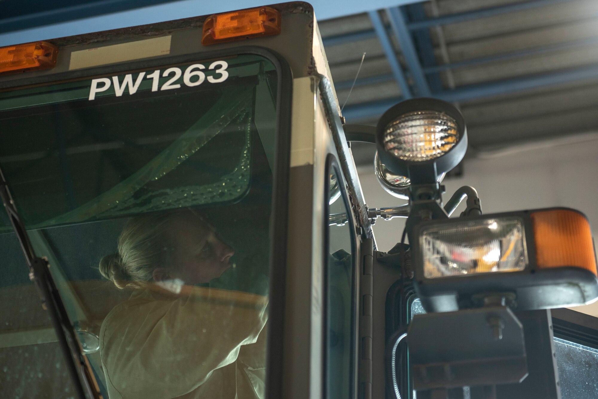 The spotlight improves visibility for the vehicle operator, so proper repairs can be made, and reduces the risk of accidents that occur in low light environments. (U.S. Air Force photo by Airman 1st Class Kylee Tyus)