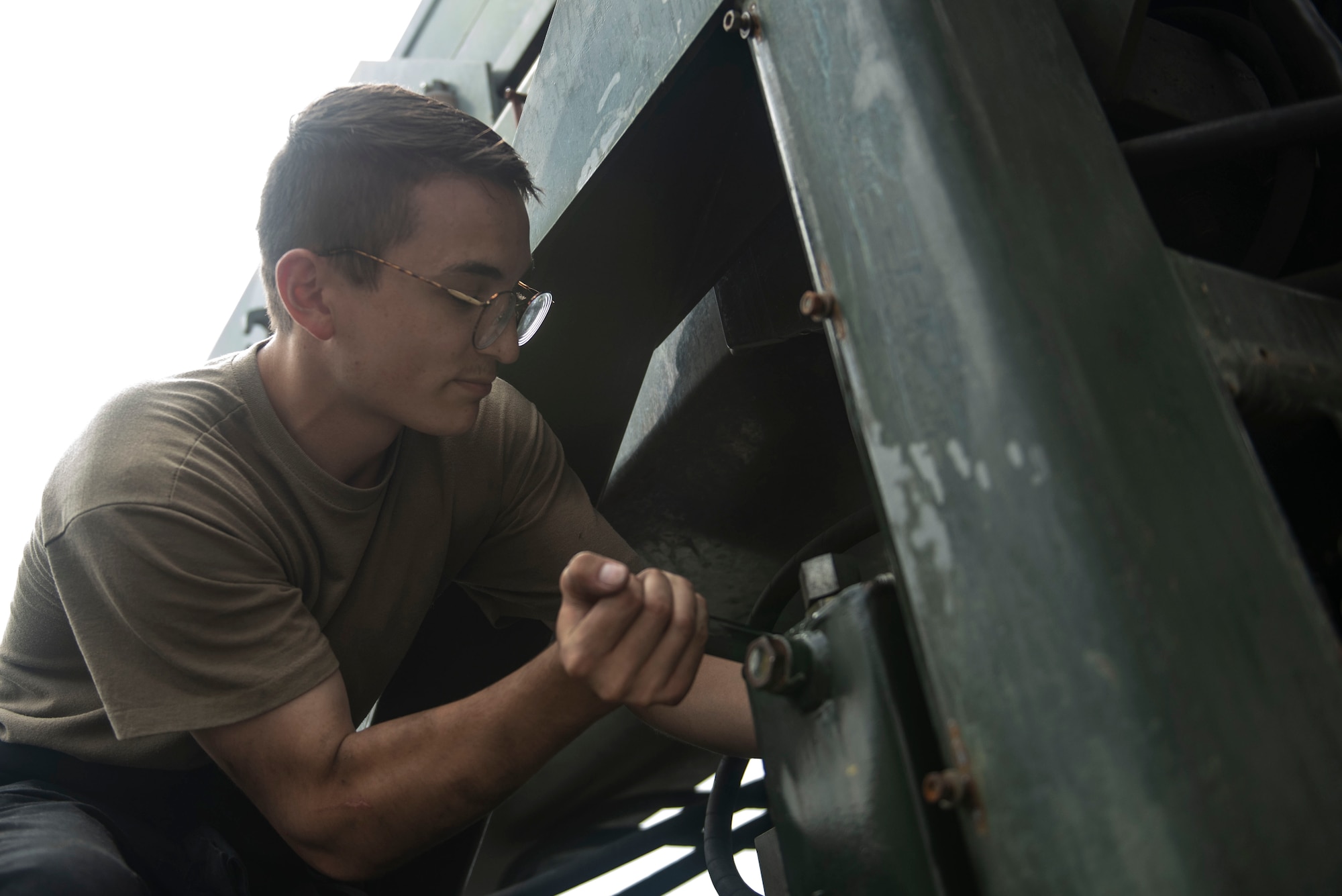 Tightening all hoses ensures there is no fluid loss within the hydronic system because if the system were exposed to a leak, it would not function properly. (U.S. Air Force photo by Airman 1st Class Kylee Tyus)