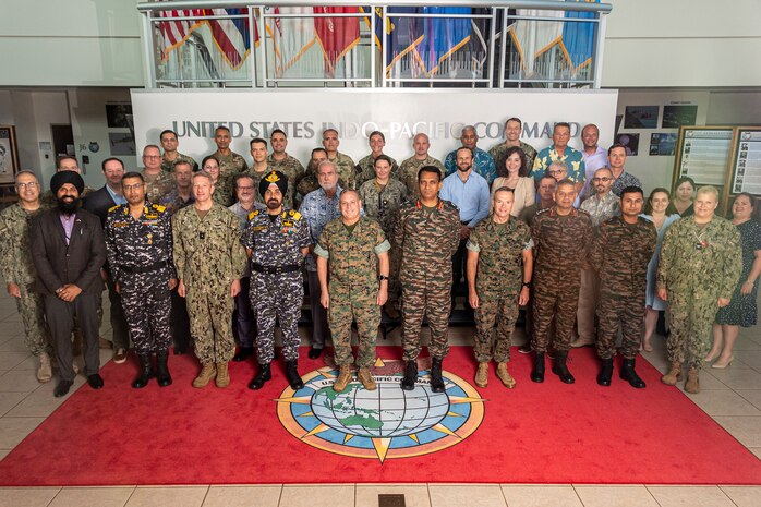 Senior military officers from U.S. Indo-Pacific, Central and Africa commands and India’s Chief of Integrated Defence Staff to the Chairman Chiefs of Staff Committee take a group photo during the 20th Military Cooperation Group (MCG) at USINDOPACOM at Camp H.M. Smith, Hawaii on Aug. 30. The 20th MCG comprised two days of substantive bilateral discussion aimed at further strengthening military-to-military cooperation in the Indo-Pacific Region and beyond. USINDOPACOM is committed to enhancing stability in the Indo-Pacific region by promoting security cooperation, encouraging peaceful development, responding to contingencies, deterring aggression and, when necessary, fighting to win. (U.S. Navy photo by Chief Mass Communication Specialist Shannon M. Smith)