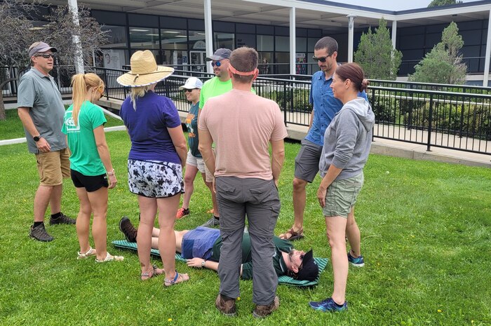 running through a rescue with a "victim" on a makeshift stretcher.