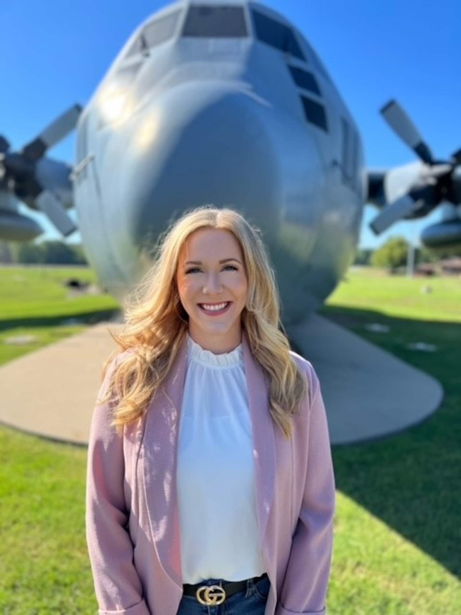 A woman poses for a photo