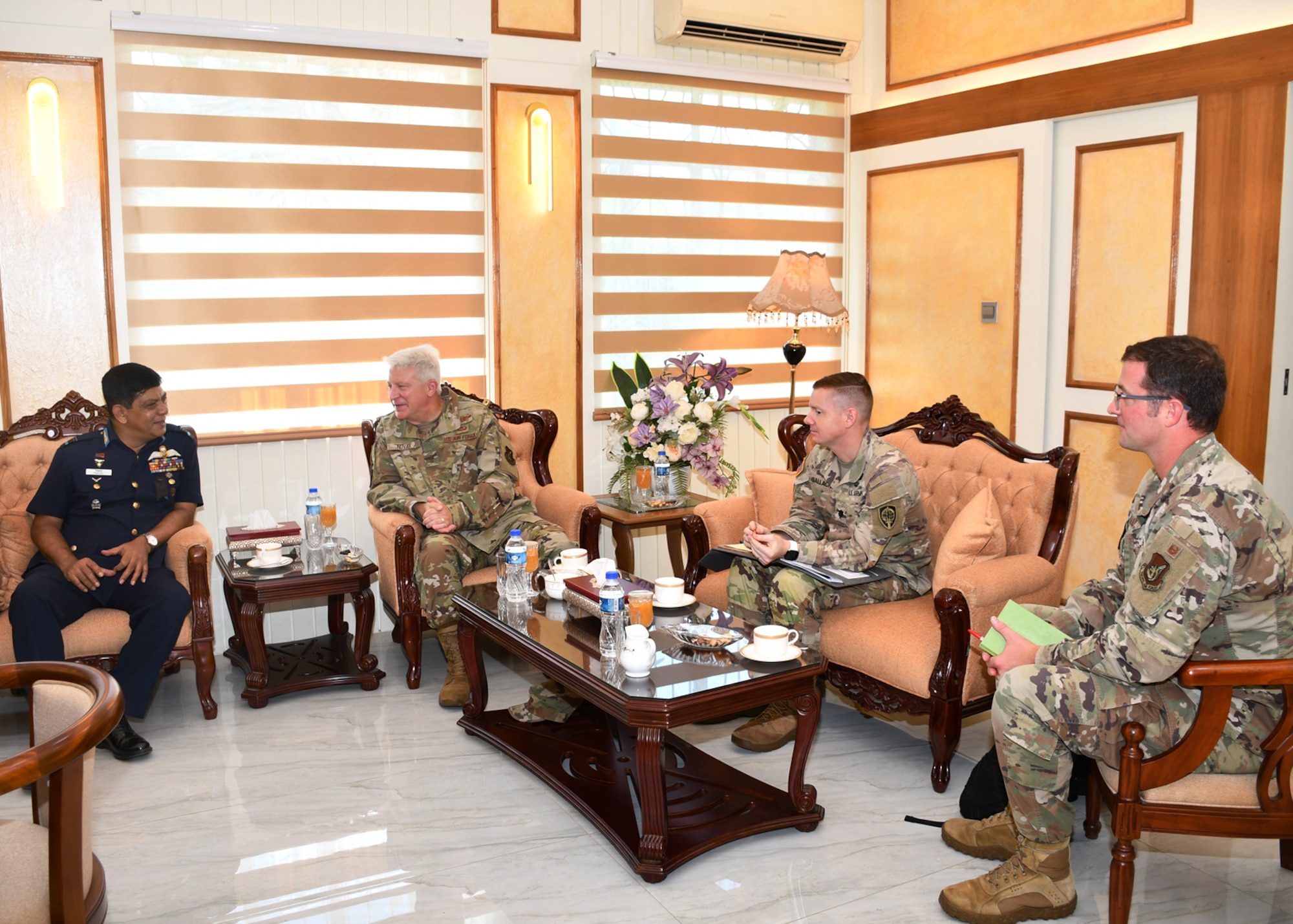 Photo of a U.S. Air Force General meeting with a Bangladesh Air Force Air Vice Marshal