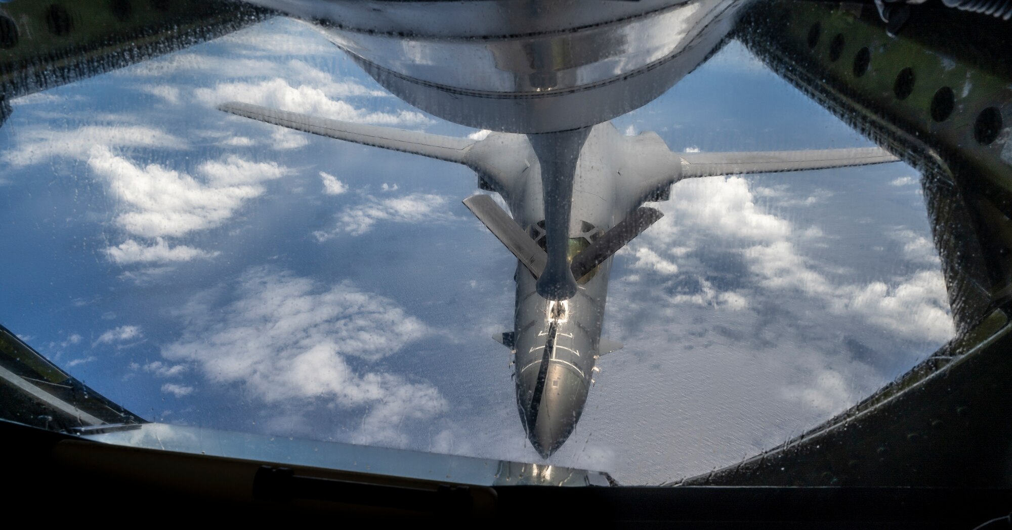 A B-1B Lancer assigned to the 28th Bomb Wing, Ellsworth Air Force Base, South Dakota, approaches a KC-135 Stratotanker from the 909th Air Refueling Squadron to receive fuel over the Sea of Japan, Aug. 30, 2023.