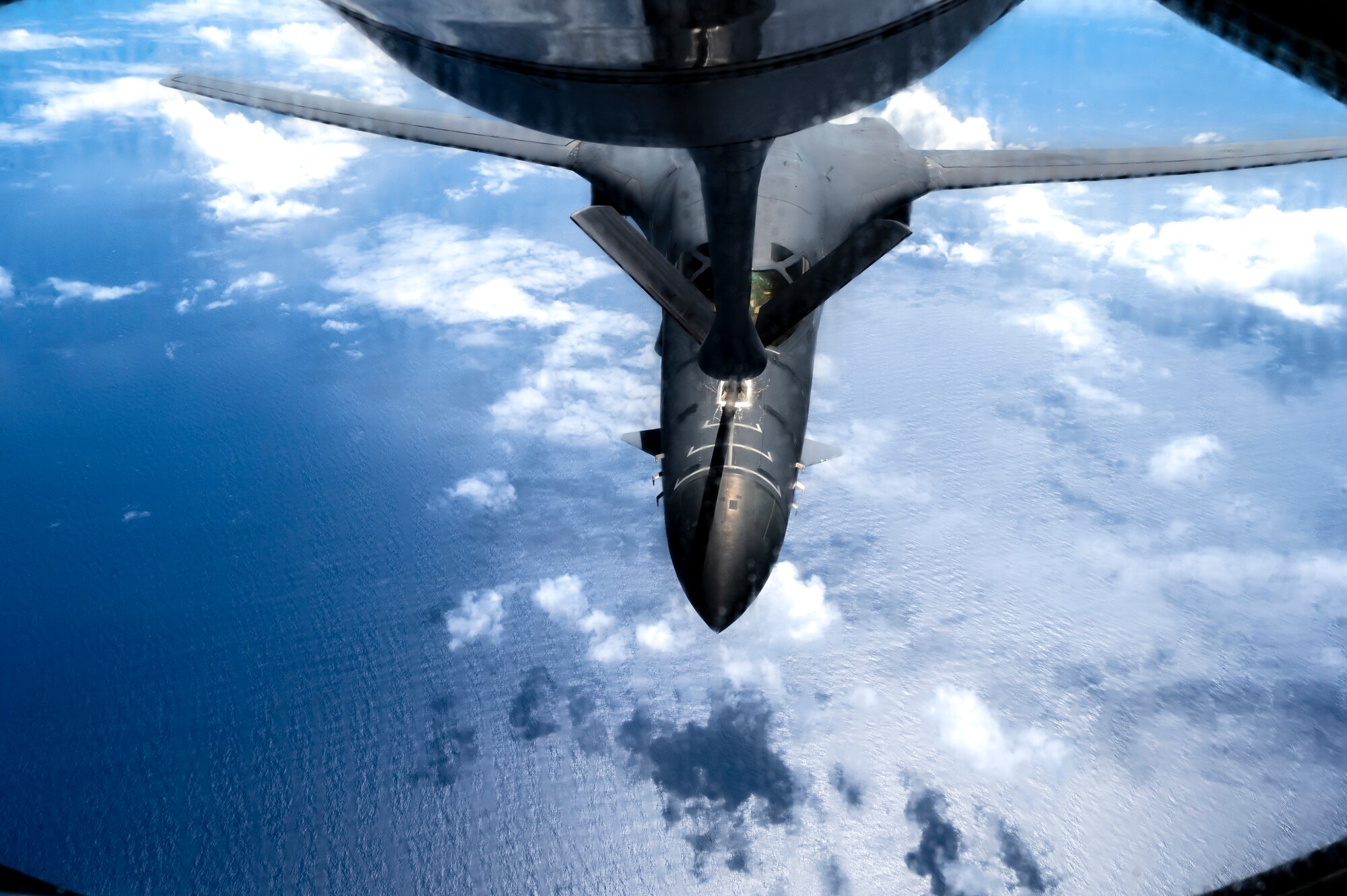 A B-1B Lancer from the 28th Bomb Wing, Ellsworth Air Force Base, South Dakota, receives fuel from a KC-135 Stratotanker assigned to the 909th Air Refueling Squadron over the Sea of Japan, Aug. 30, 2023.
