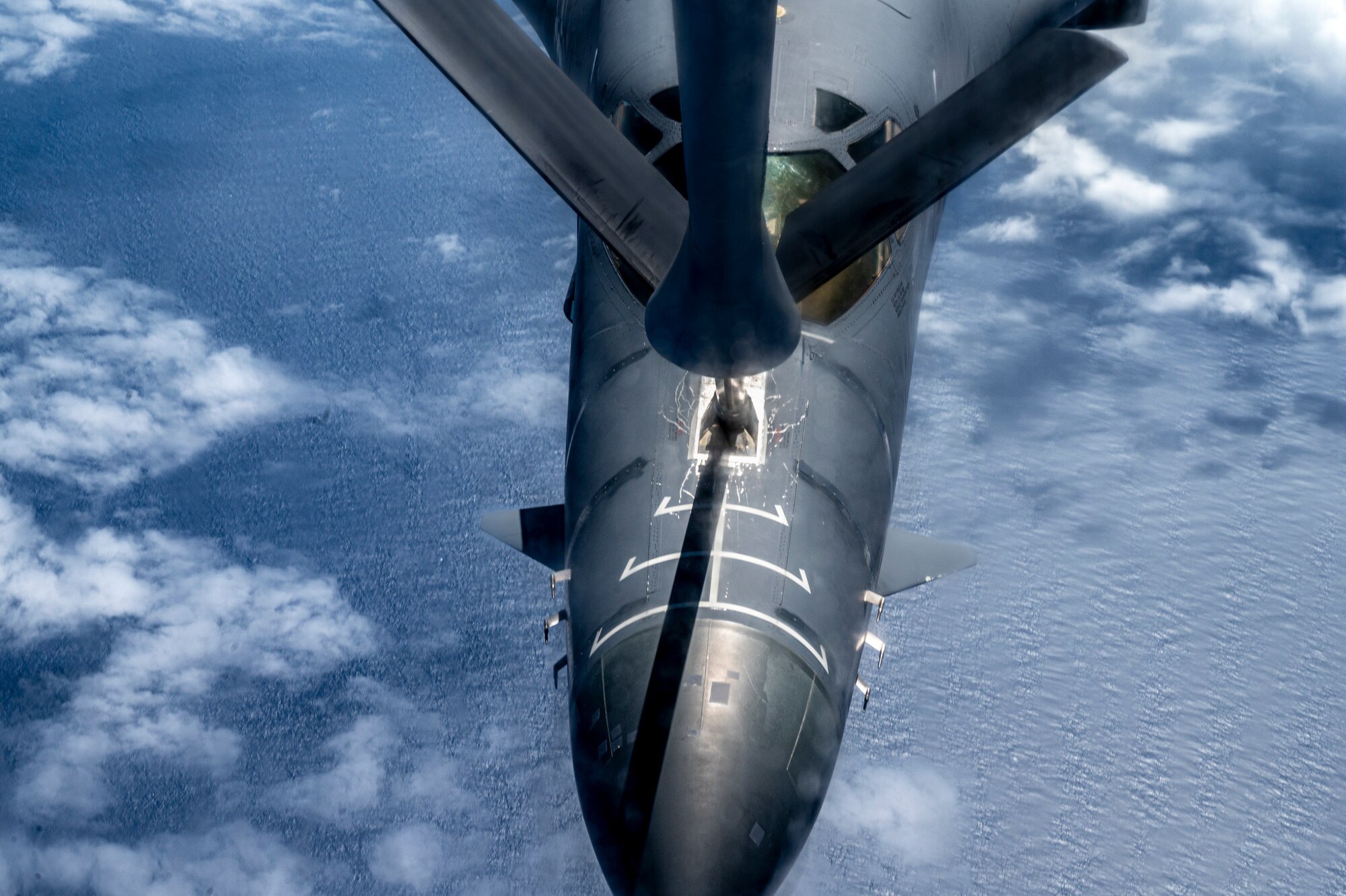A B-1B Lancer from the 28th Bomb Wing, Ellsworth Air Force Base, South Dakota, receives fuel from a KC-135 Stratotanker assigned to the 909th Air Refueling Squadron over the Sea of Japan, August 30, 2023.