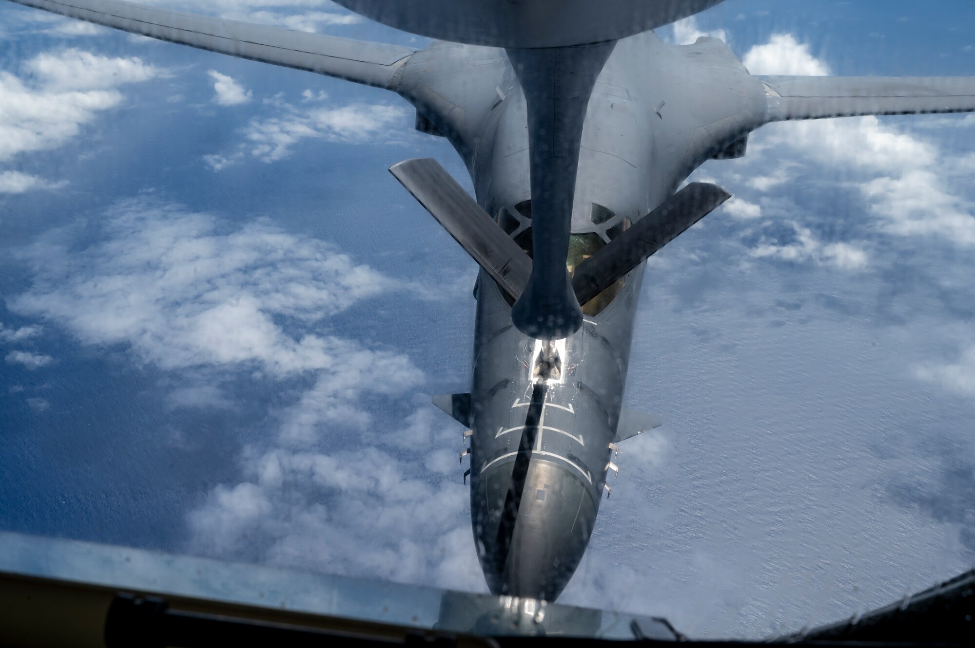 A B-1B Lancer from the 28th Bomb Wing, Ellsworth Air Force Base, South Dakota, receives fuel from a KC-135 Stratotanker assigned to the 909th Air Refueling Squadron over the Sea of Japan, Aug. 30, 2023.