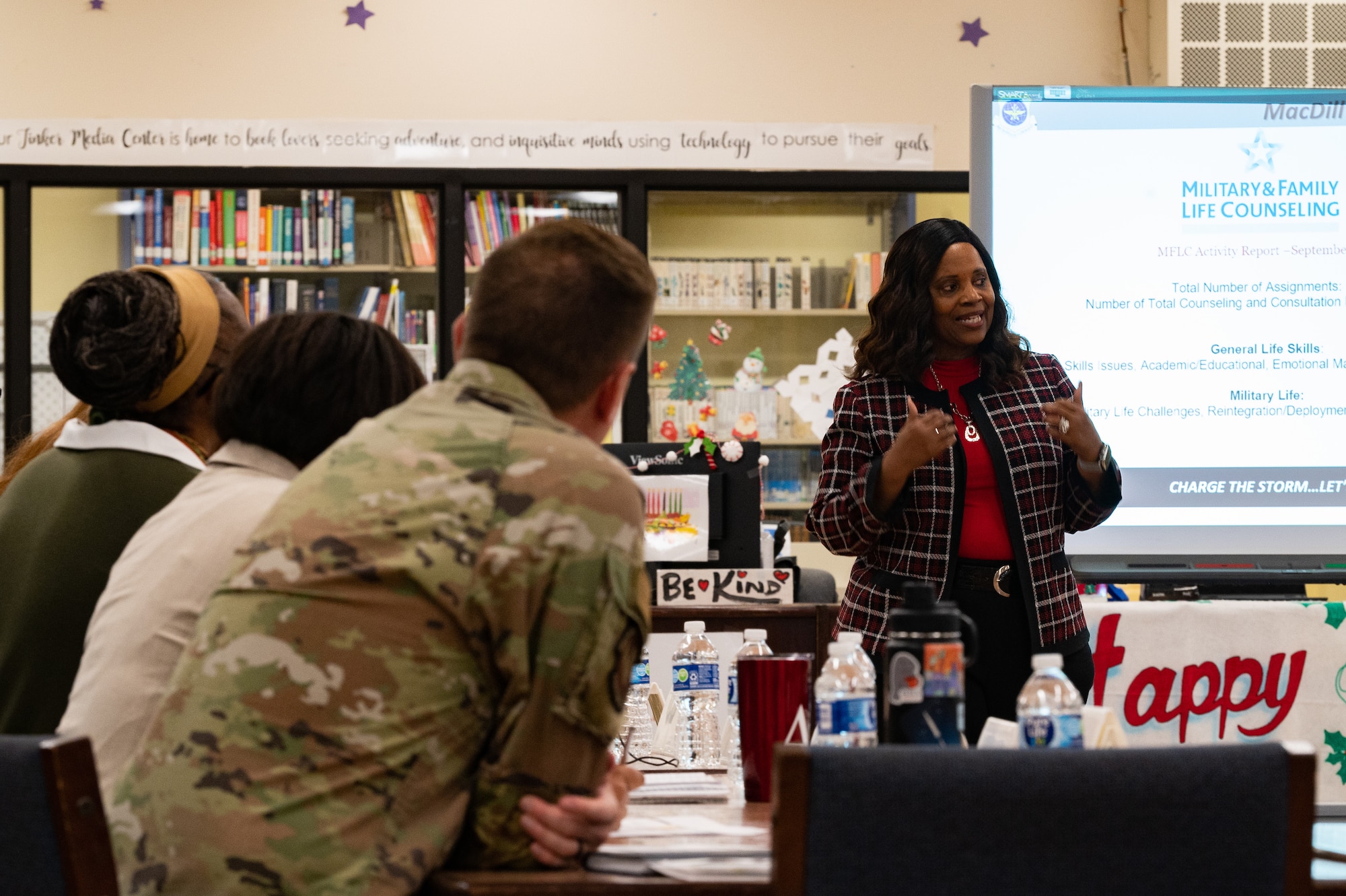 Military and District leaders listen to a brief about Military and Family Life Counseling services during a MacDill Council for Education Excellence meeting at MacDill Air Force Base, Florida, Nov. 27, 2023.