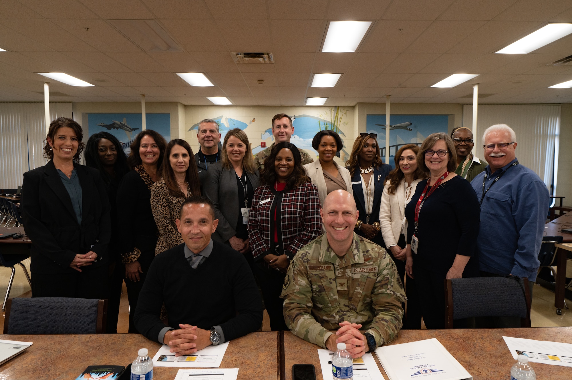 Military and District leaders pose for a photo during a MacDill Council for Education Excellence meeting at MacDill Air Force Base, Florida, Nov. 27, 2023.