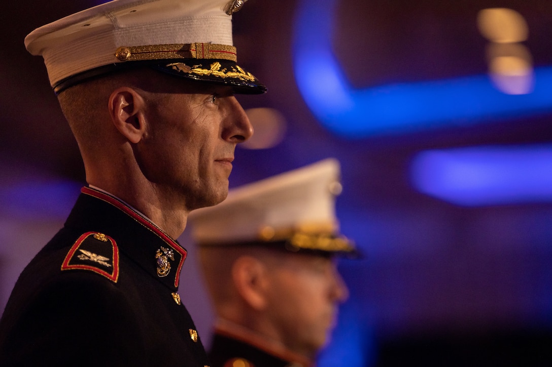 U.S. Marine Corps Col. Matthew Swindle, outgoing commanding officer of the Marine Innovation Unit, stands at attention during a change of command ceremony, Queens, New York, Nov. 5, 2023. The ceremony occurred at a ball hosted by MIU, celebrating the Marine Corps' 248th annual birthday. Col. Brooks Braden assumed command of MIU. Stood up in March 2022, the unit leverages existing Marine talent in order to: accelerate the adoption of advanced capabilities; transform Naval Service capacity for technology employment; and retain and invest in Total Force human capital. (U.S. Marine Corps photo by Lance Cpl. David Intriago)