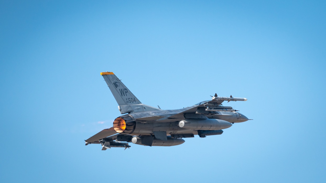 A U.S. Air Force F-16 Fighting Falcon assigned to the 80th Fighter Squadron flies over Kunsan Air Base, South Korea