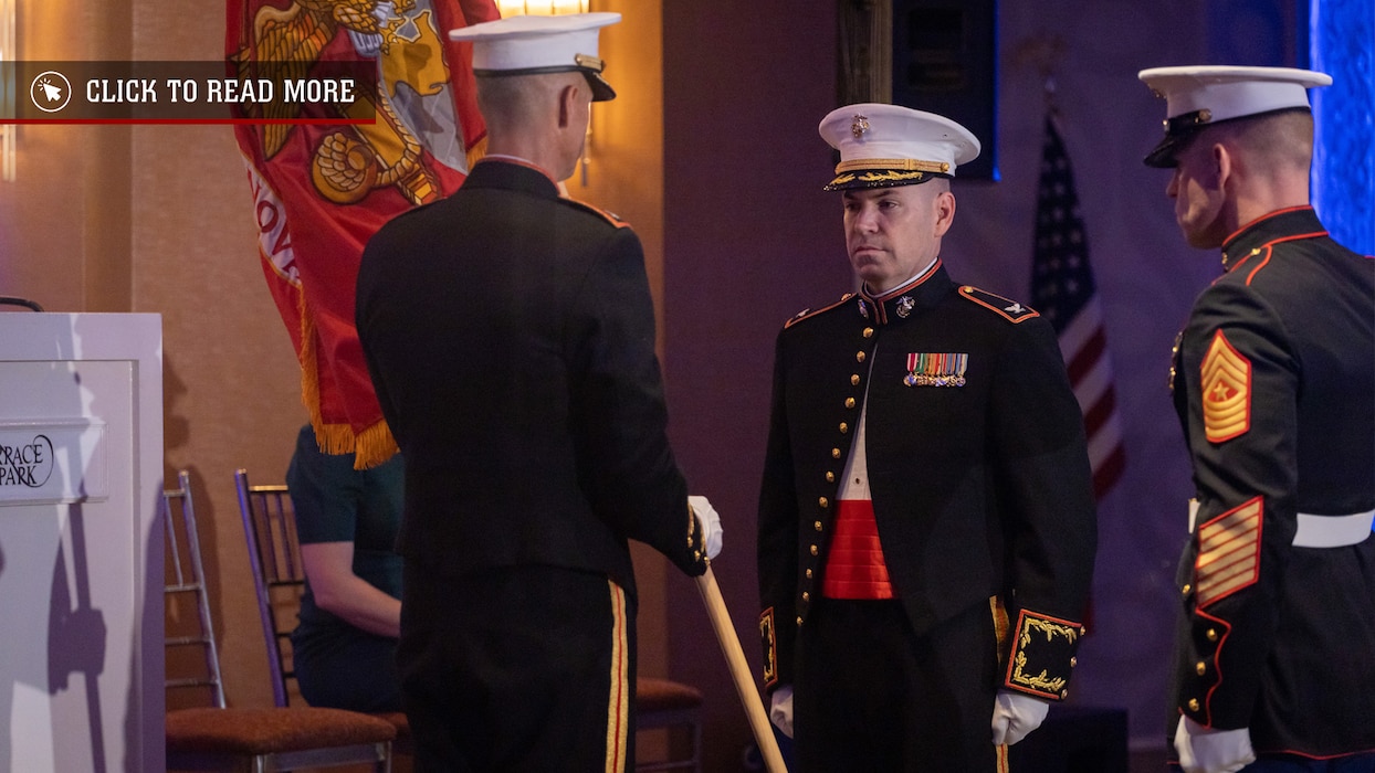 U.S. Marine Corps Col. Matthew Swindle, left, outgoing commanding officer of the Marine Innovation Unit, holds the colors during a change of command ceremony, Queens, New York, Nov. 5, 2023. The ceremony occurred at a ball hosted by MIU, celebrating the Marine Corps' 248th annual birthday. Col. Brooks Braden, right, assumed command of MIU. Stood up in March 2022, the unit leverages existing Marine talent in order to: accelerate the adoption of advanced capabilities; transform Naval Service capacity for technology employment; and retain and invest in Total Force human capital. (U.S. Marine Corps photo by Lance Cpl. David Intriago)