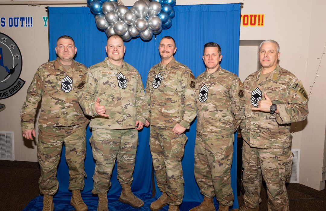 U.S. Air Force Chief Master Sergeant selects from the 354th Fighter Wing, pose for a group photo during the CMSgt release party November 29, 2023 at Eielson Air Force Base, Alaska.