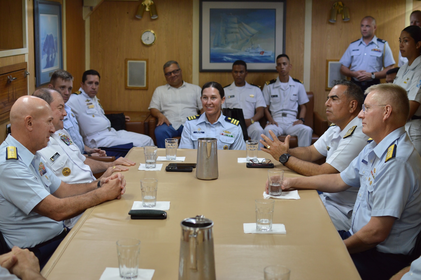 U.S. Coast Guard Cutter Bear's (WMEC 901) Commanding Officer Cmdr. Brooke Millard holds a meeting in Bear's wardroom with the Colombian Chief of Naval Operations Vice Adm. Orlando Enrique Grisales Franceschi, U.S. Coast Guard Director of Joint Interagency Task Force South Rear Adm. Mark Fedor, U.S. Coast Guard Seventh District Commander Rear Adm. Douglas Schofield, and the Columbian Commander of the Caribbean Naval Force Vice Admiral Hernando Enrique Mattos Dager. Bear's crew cross-trained with the Colombian Navy, sharing maritime safety and security tactics. (U.S. Coast Guard photo by Ensign Melody Silva)