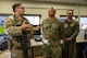 Rear Adm. Robert Wirth, J5N, U.S. Strategic Command deputy director, strategic targeting and nuclear mission planning, receives a post brief by U.S. Air Force Staff Sgt. Thomas Archbold, 91st Missile Wing flight security controller, at Missile Alert Facility (MAF) Oscar-1, North Dakota, Nov. 29, 2023. The 91st MW has a no-fail mission that requires Airmen to be on alert 24/7. (U.S. Air Force photo by Airman 1st Class Alexander Nottingham)