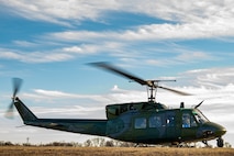 A UH-1N Iroquois transporting Rear Adm. Robert Wirth, J5N, U.S. Strategic Command deputy director, strategic targeting and nuclear mission planning, back to Minot Air Force Base, North Dakota, Nov. 29, 2023. The UH-1N is operated by the 54th Helicopter Squadron and is used by the 91st Missile Wing for quick transportation around the Minot missile field. (U.S. Air Force photo by Airman 1st Class Alexander Nottingham)