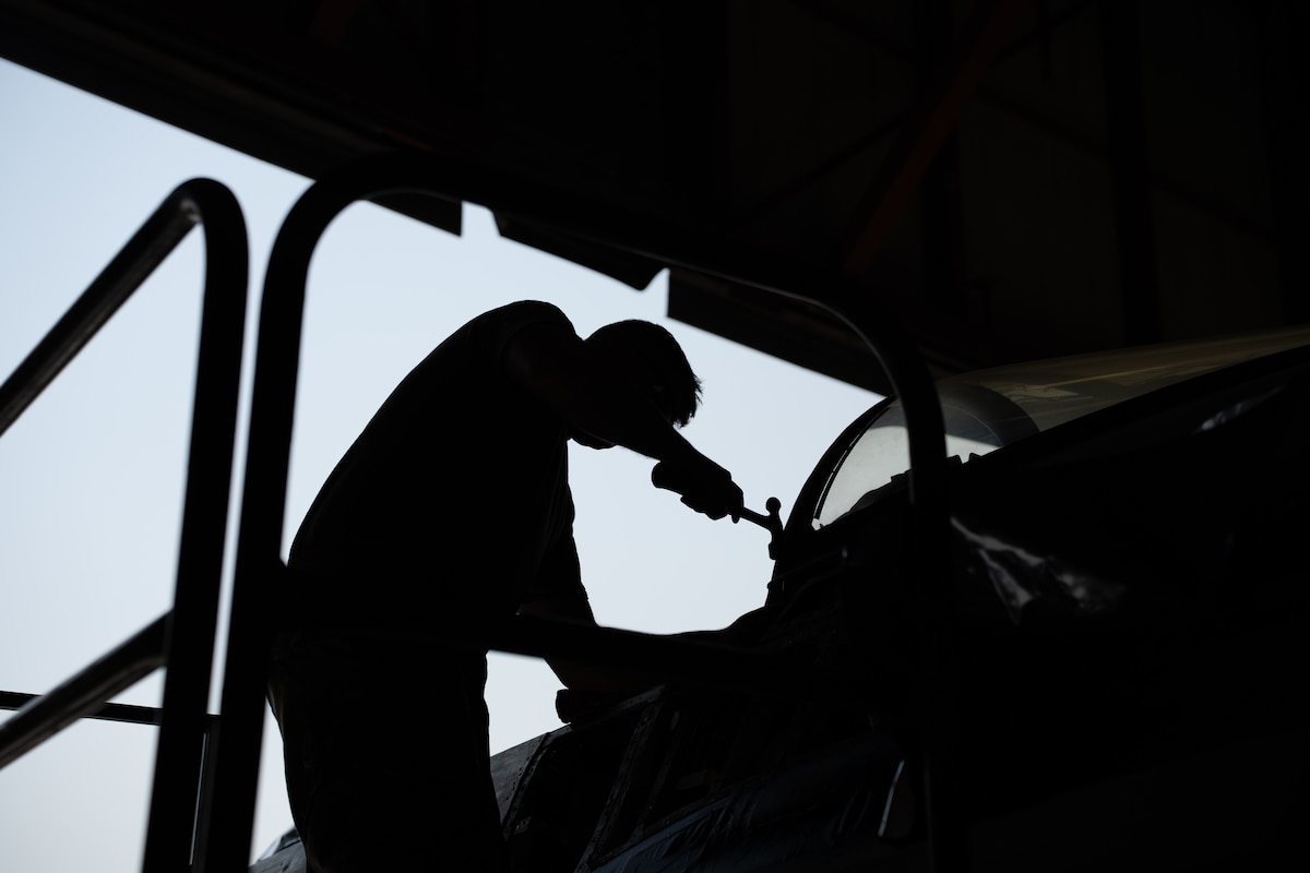 Staff Sgt. Staff Sgt. Bryce Engbarth, 114th Maintenance Squadron aircraft structural airman, works on removing parts on a F-16 during the canopy sill longeron repair.