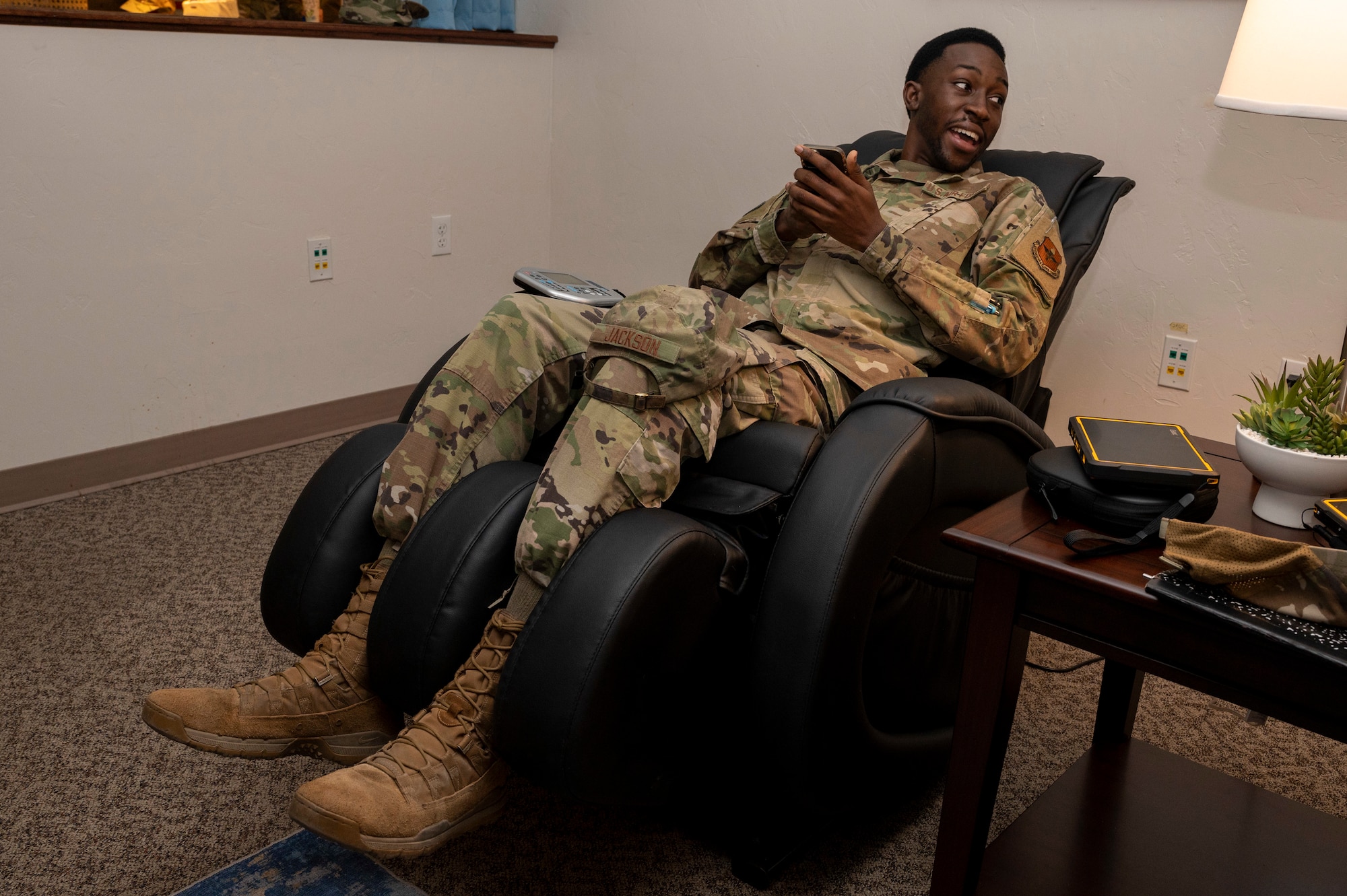 U.S. Air Force Senior Airman Chase Jackson, 49th Maintenance Group command support section technician, uses a massage chair at the 49th MXG's new resiliency and relaxation at Holloman Air Force Base, New Mexico, Nov. 29, 2023.