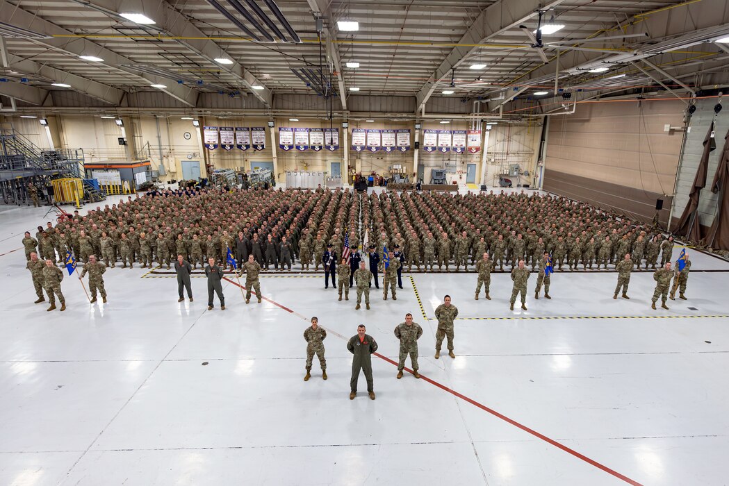 Airmen in wing formation.