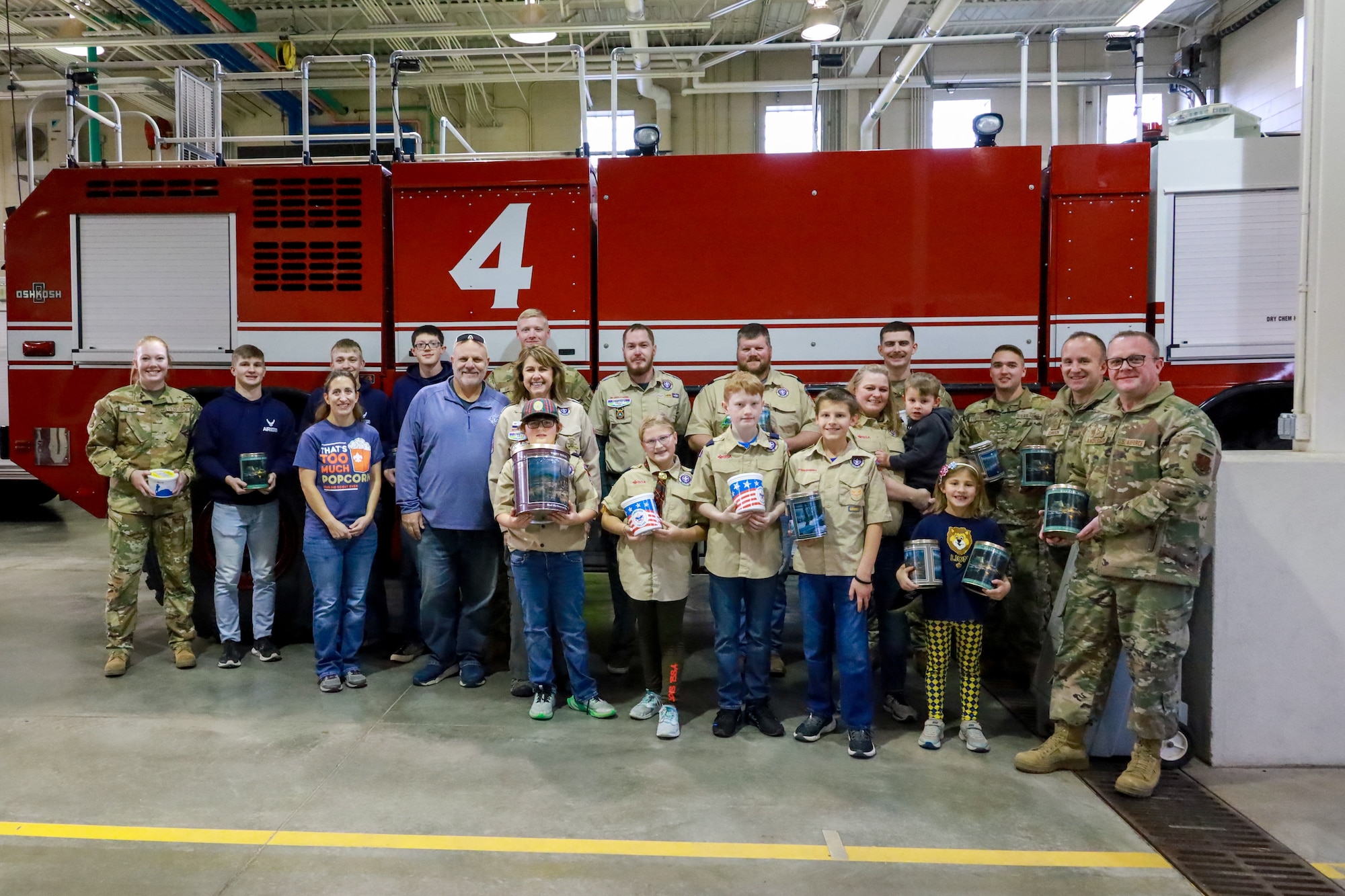 Boy Scouts of America Sioux Council Pack 208 bring popcorn to members of the South Dakota Air National Guard during December's unit training assembly, marking the launch of a partnership between the two organizations, December 2, 2023.