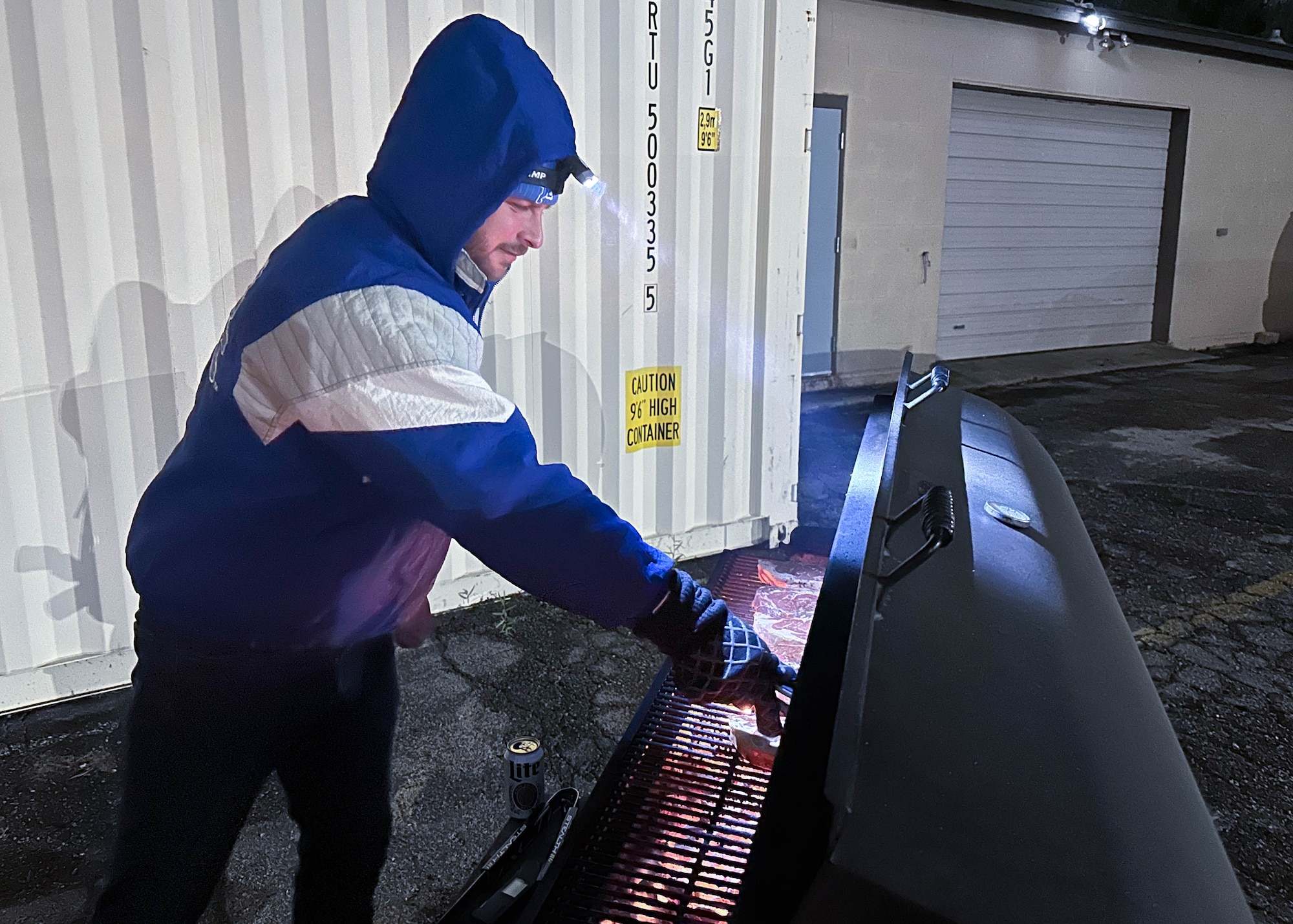 Man grilling steaks