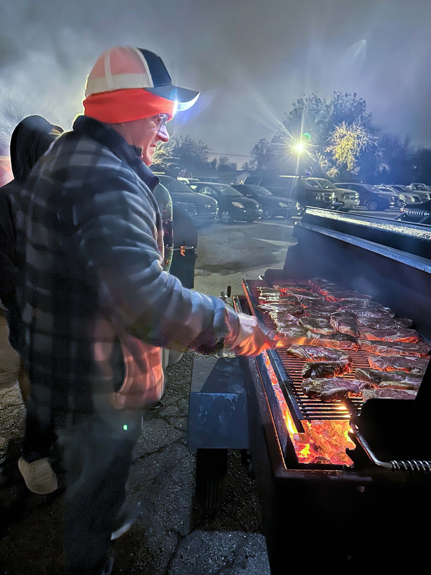 Man grilling steaks