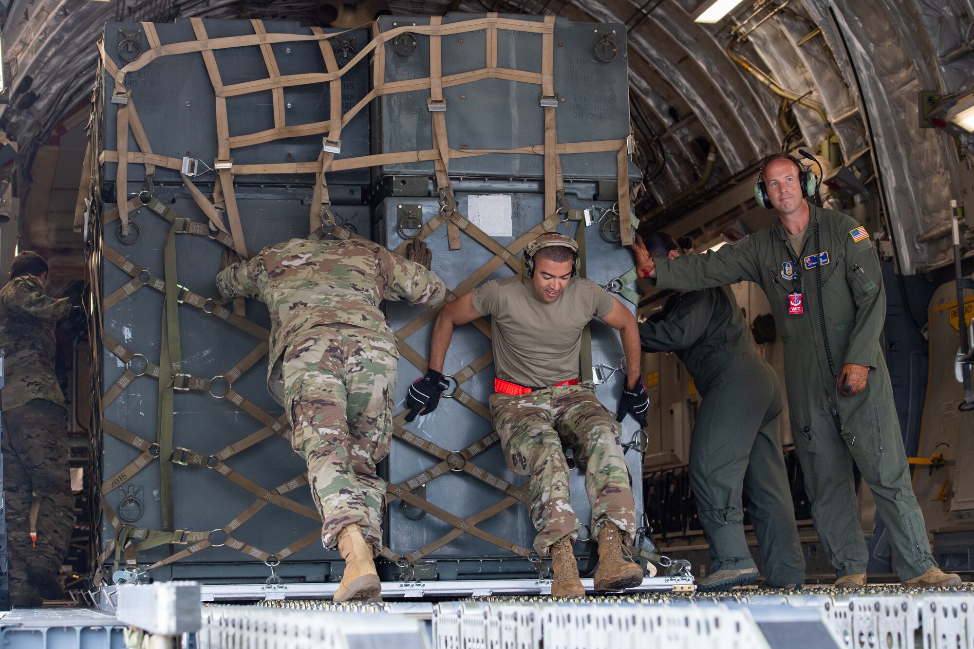 Reserve Citizen Airmen with the 732nd Airlift Squadron, 514th Air Mobility Wing, load cargo onto a C-17 Globemaster III at Joint Base McGuire-Dix-Lakehurst, N.J., Sept. 9, 2023.