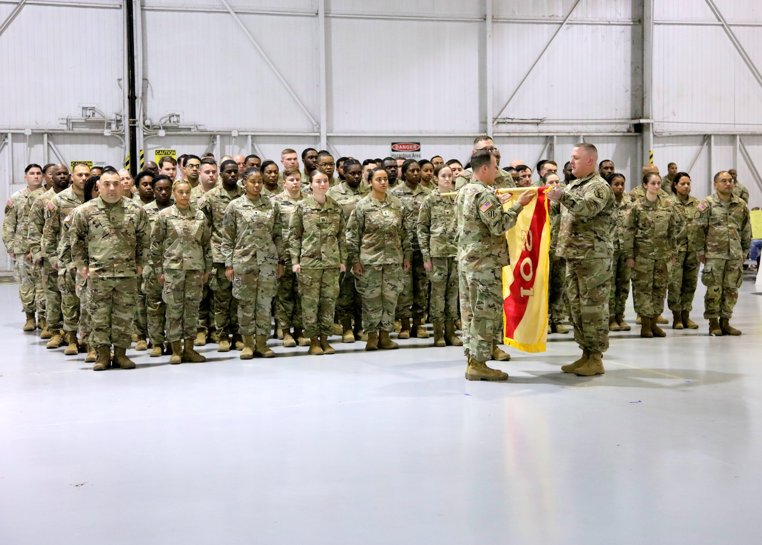 Col. Matthew Kukla and Command Sgt. Major Lafayette Deal, command team of the Georgia National Guard’s 201st Regional Support Group (Forward), uncase the unit colors during a welcome home ceremony at the Clay National Guard Center in Marietta, Ga., Dec. 1 following a 10-month deployment to Europe.