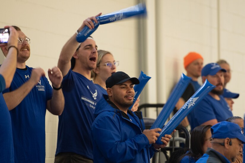 U.S. Air Force Wounded Warrior audience members cheer during wheelchair rugby at Joint Base Andrews
