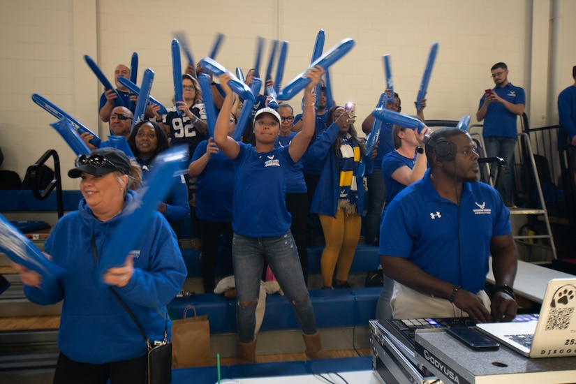 U.S. Air Force Wounded Warrior audience members cheer during a wheelchair rugby match at Joint Base Andrews