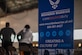 A banner is displayed at the Hangar 14 entrance during the 2023 Warrior CARE Week hosted by the Air Force Wounded Warrior program at Joint Base Andrews